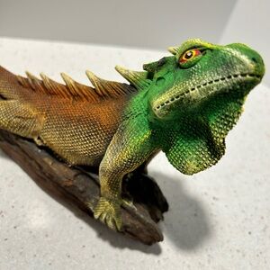 Green and Brown Reptile Figurine